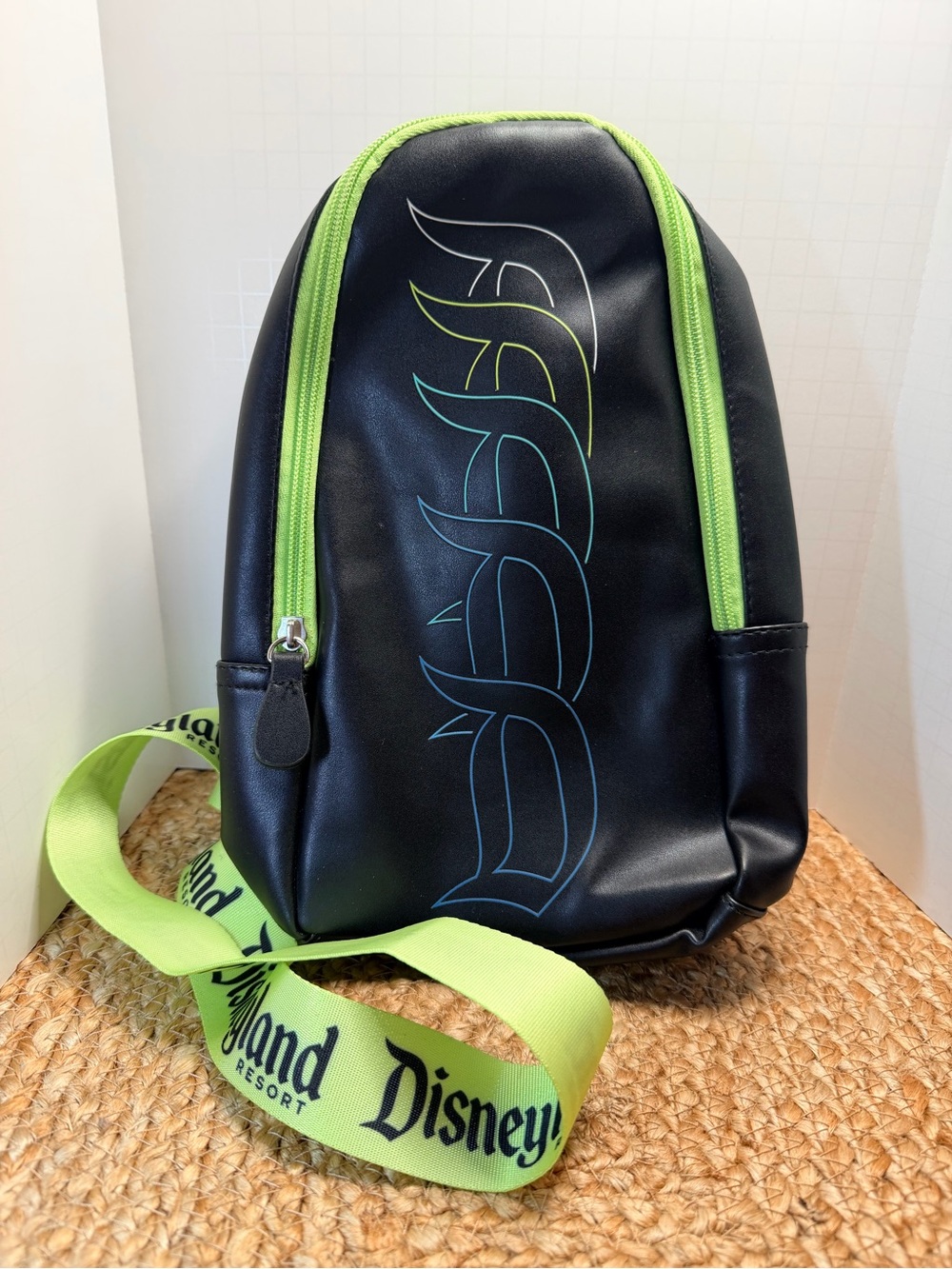 Disneyland Resort Black Sling Bag with Neon Green Accents